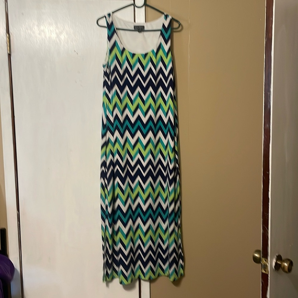 Long dress in excellent condition sleeveless very soft material.